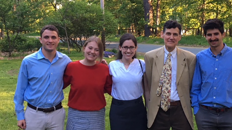 Four students and PEP Program Director Henry Clark standing together.